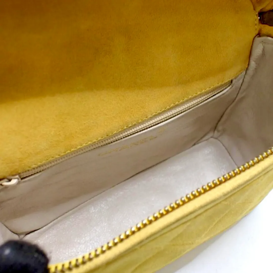 Vintage CHANEL yellow suede leather chain shoulder bag with CC tassel in lunchbox shape. 060910ac1