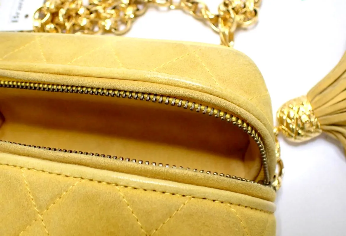 Vintage CHANEL yellow suede leather chain shoulder bag with CC tassel in lunchbox shape. 060910ac1